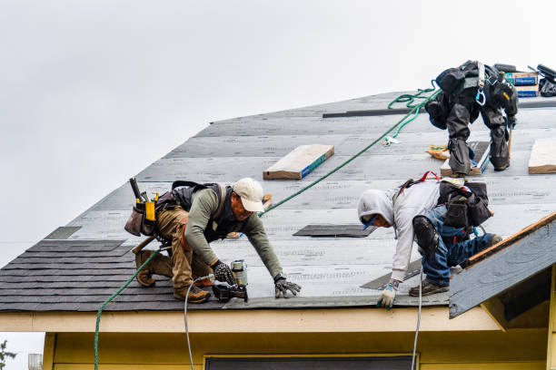 Professional Roofing technician working in Wyoming, RI